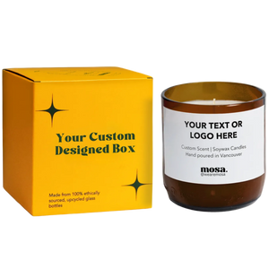 Yellow custom designed box and brown bottle candle with white label on a white background