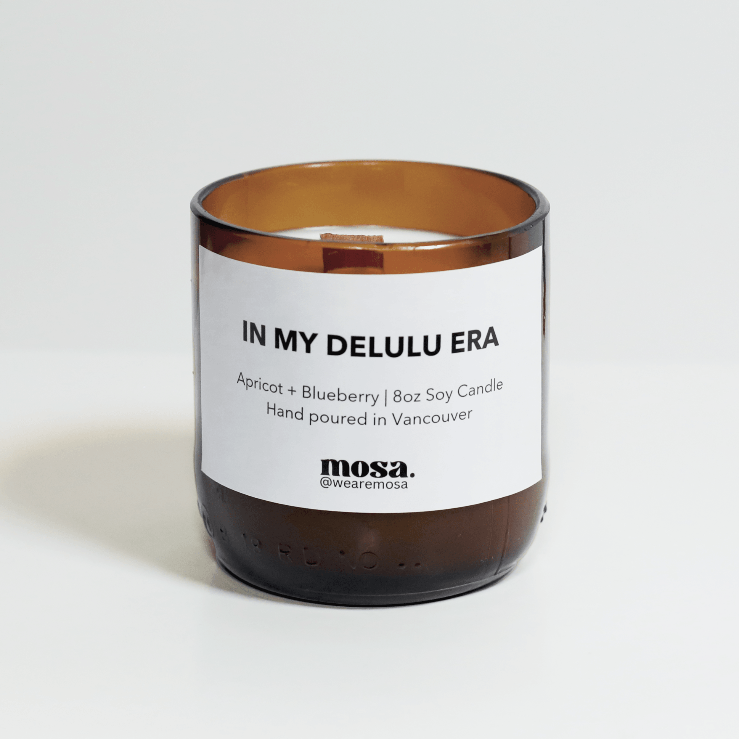 Eco-friendly gifts made with recyclable glassware, apricot and blueberry scented candle