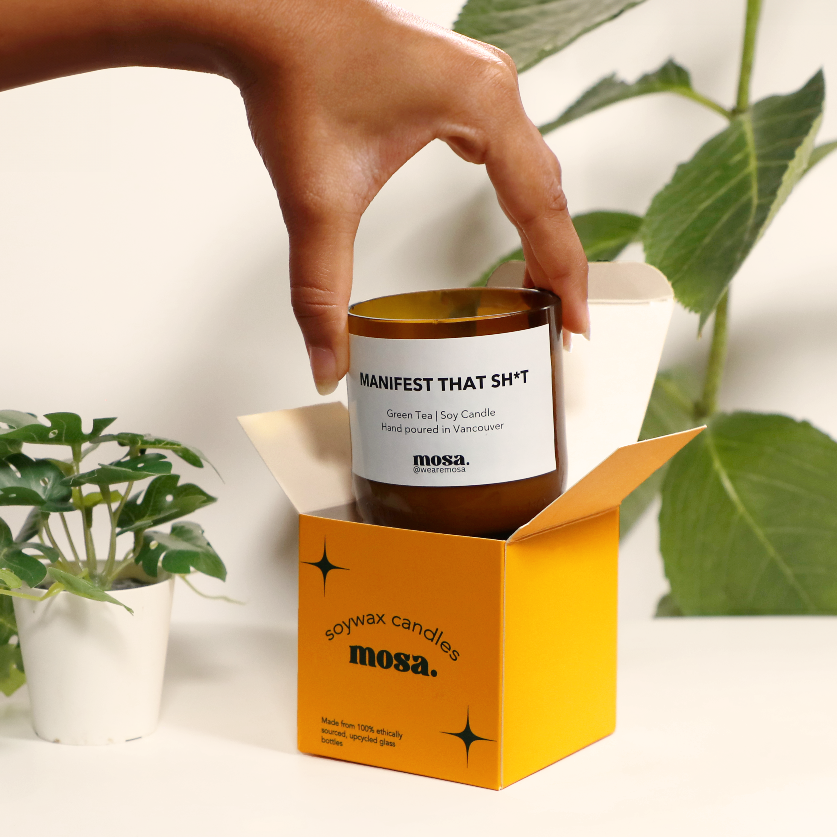 Eco-friendly gifts made with recyclable glassware, green tea candle