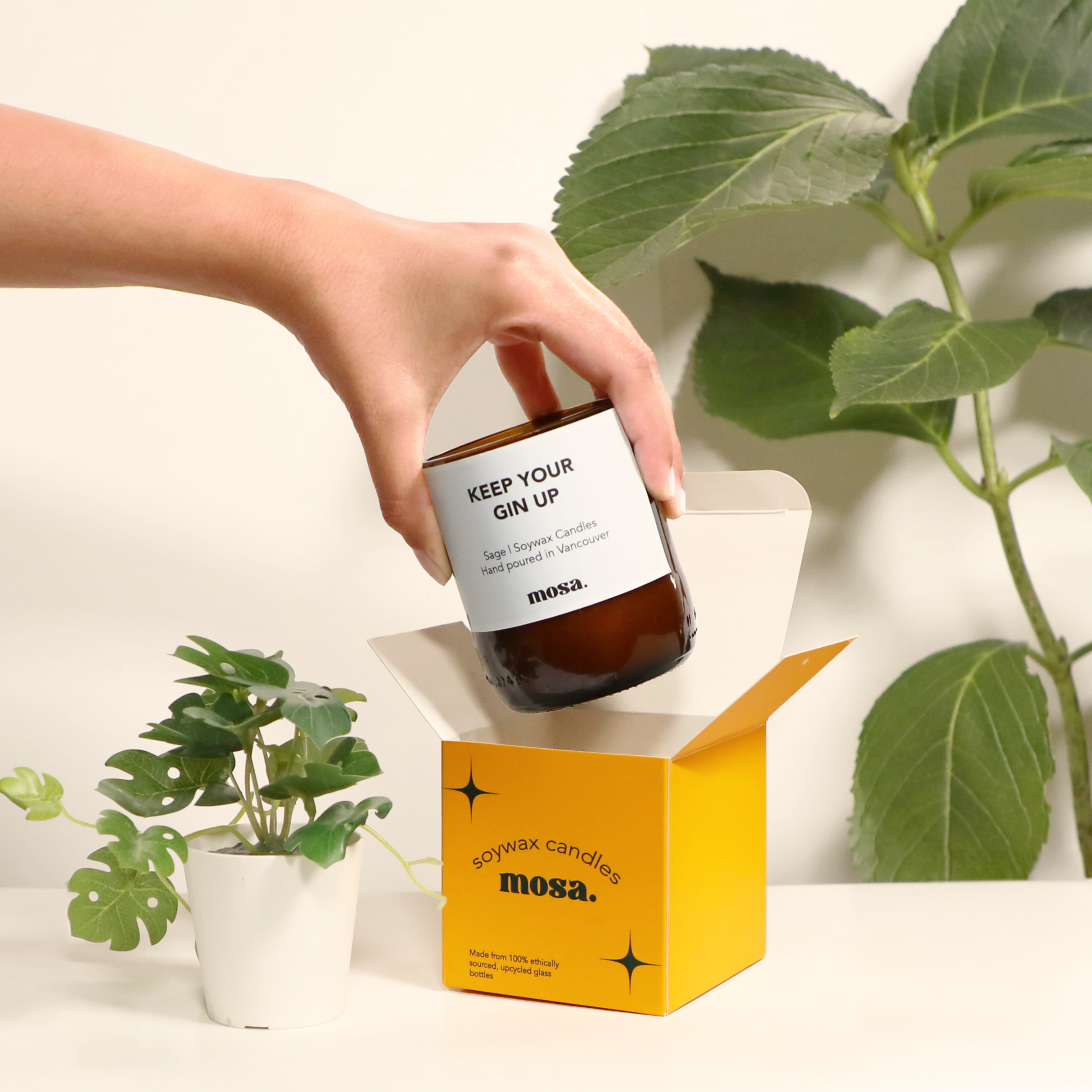 Sustainable gifts made with recyclable glassware, sage candle
