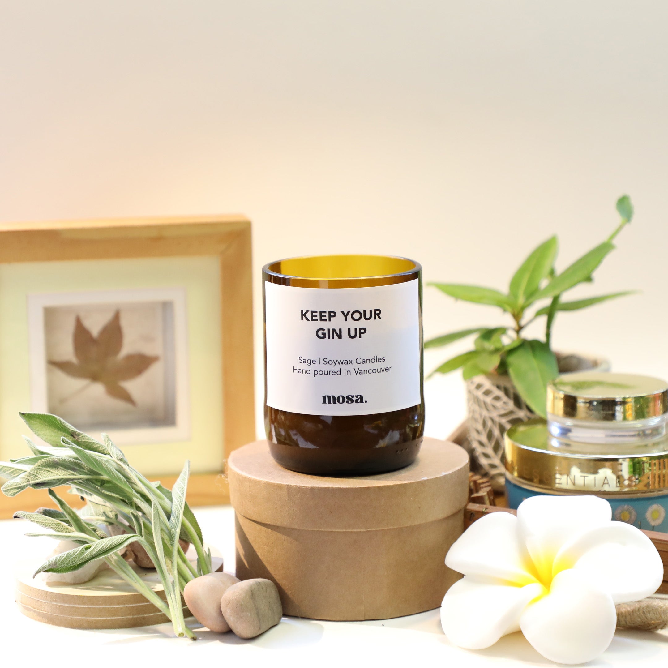 Sustainable gifts made with recyclable glassware, sage candle