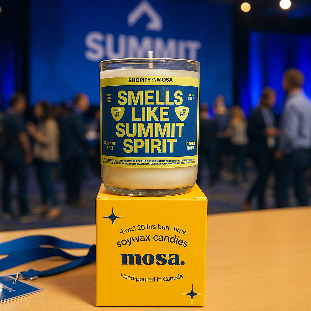 Custom upcycled soy candle made for Shopify Summit by Mosa, shown at the event as a branded giveaway.