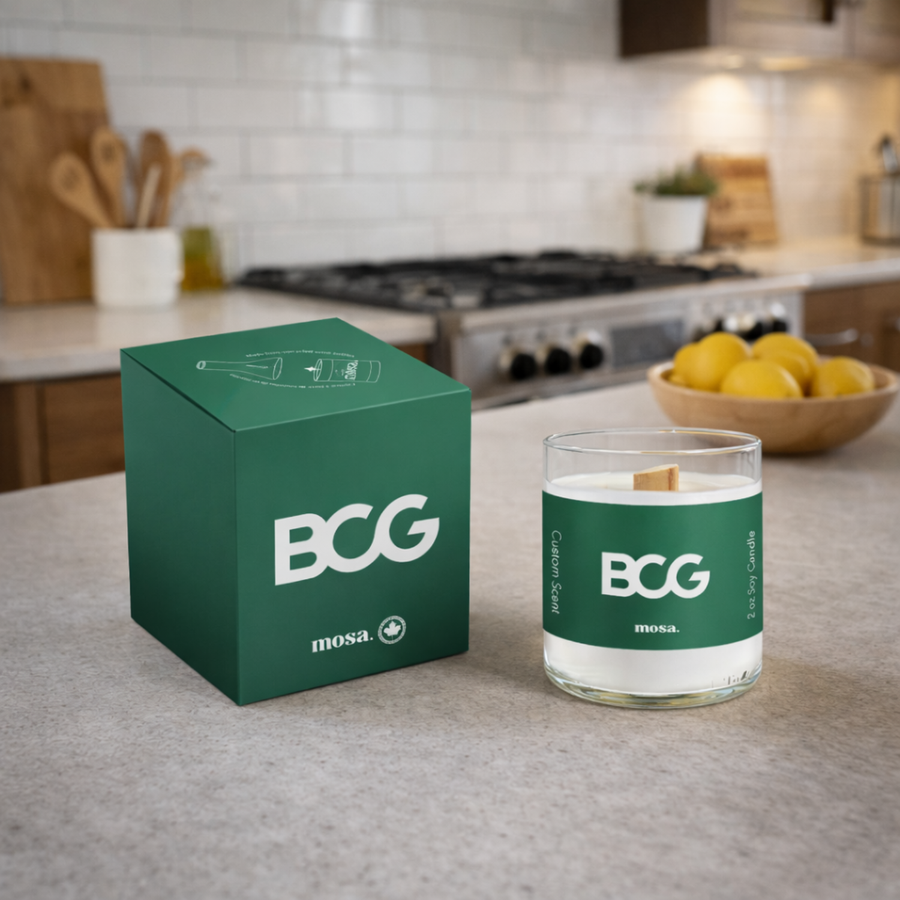 BCG custom candle and packaging on a kitchen counter