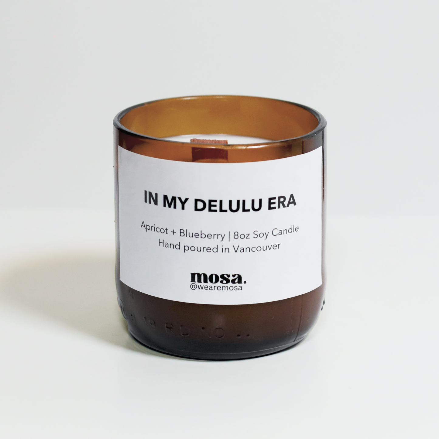 Eco-friendly gifts made with recyclable glassware, apricot and blueberry scented candle