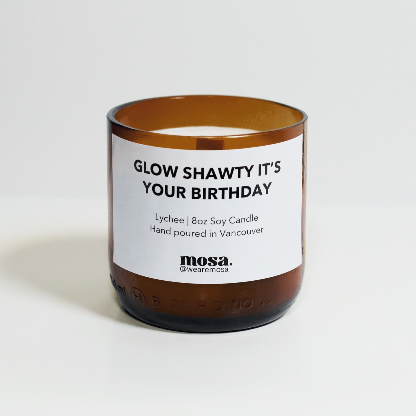 Eco-friendly gifts made with recyclable glassware, lychee-scented candle