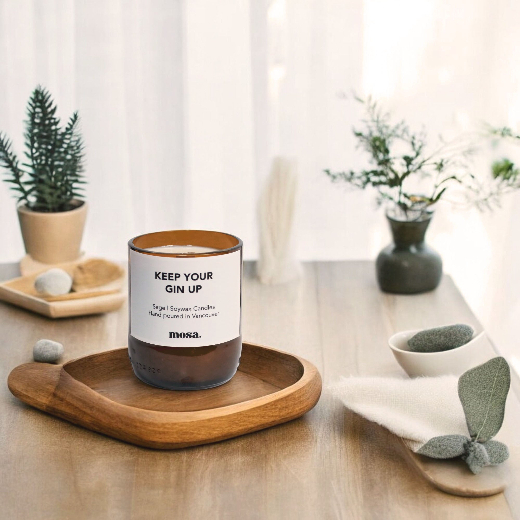 Sustainable gifts made with recyclable glassware, sage candle