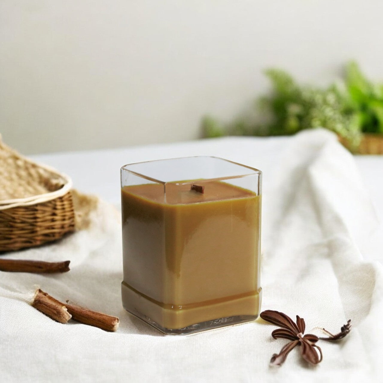 Eco-friendly gifts made with recyclable glassware, vanilla and tobacco-scented candle