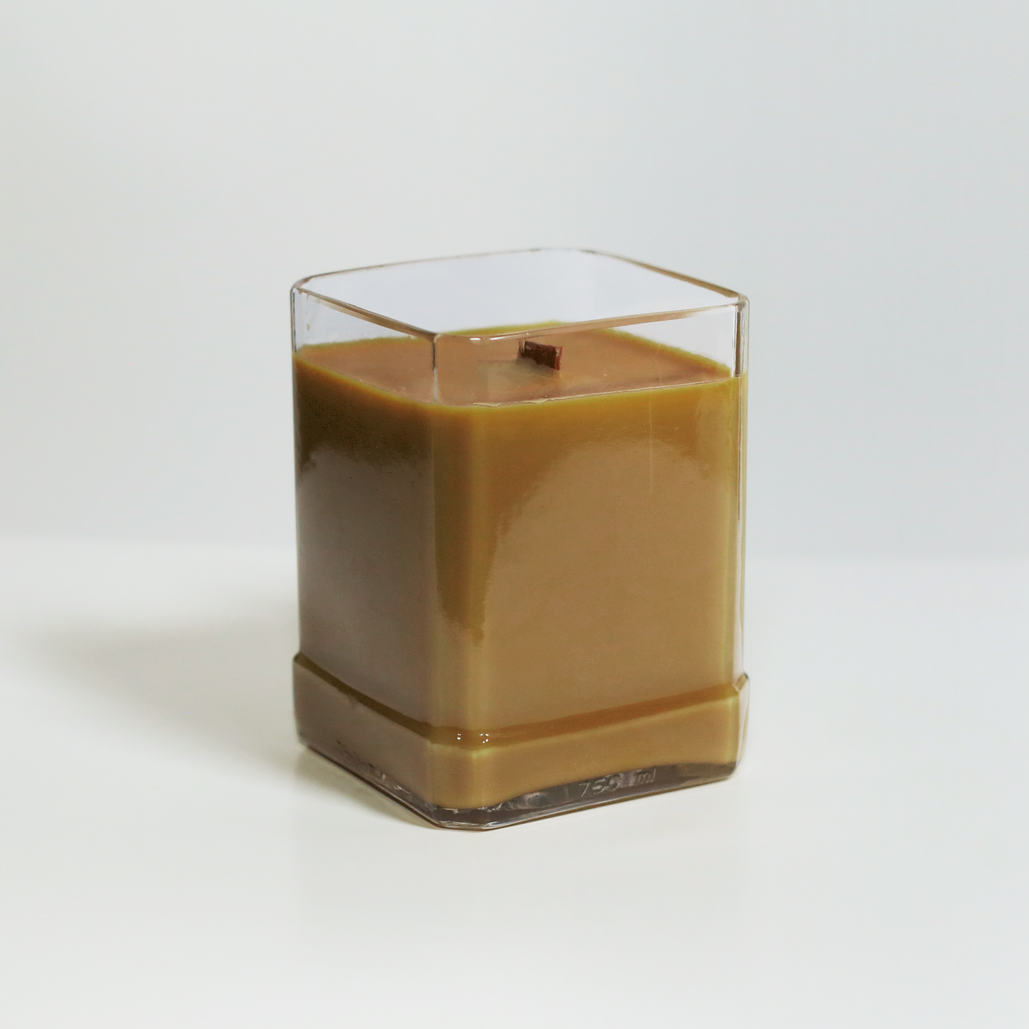 Eco-friendly gifts made with recyclable glassware, vanilla and tobacco-scented candle