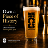 Beer glass with FIFA Vancouver 2026 logo on a wooden surface