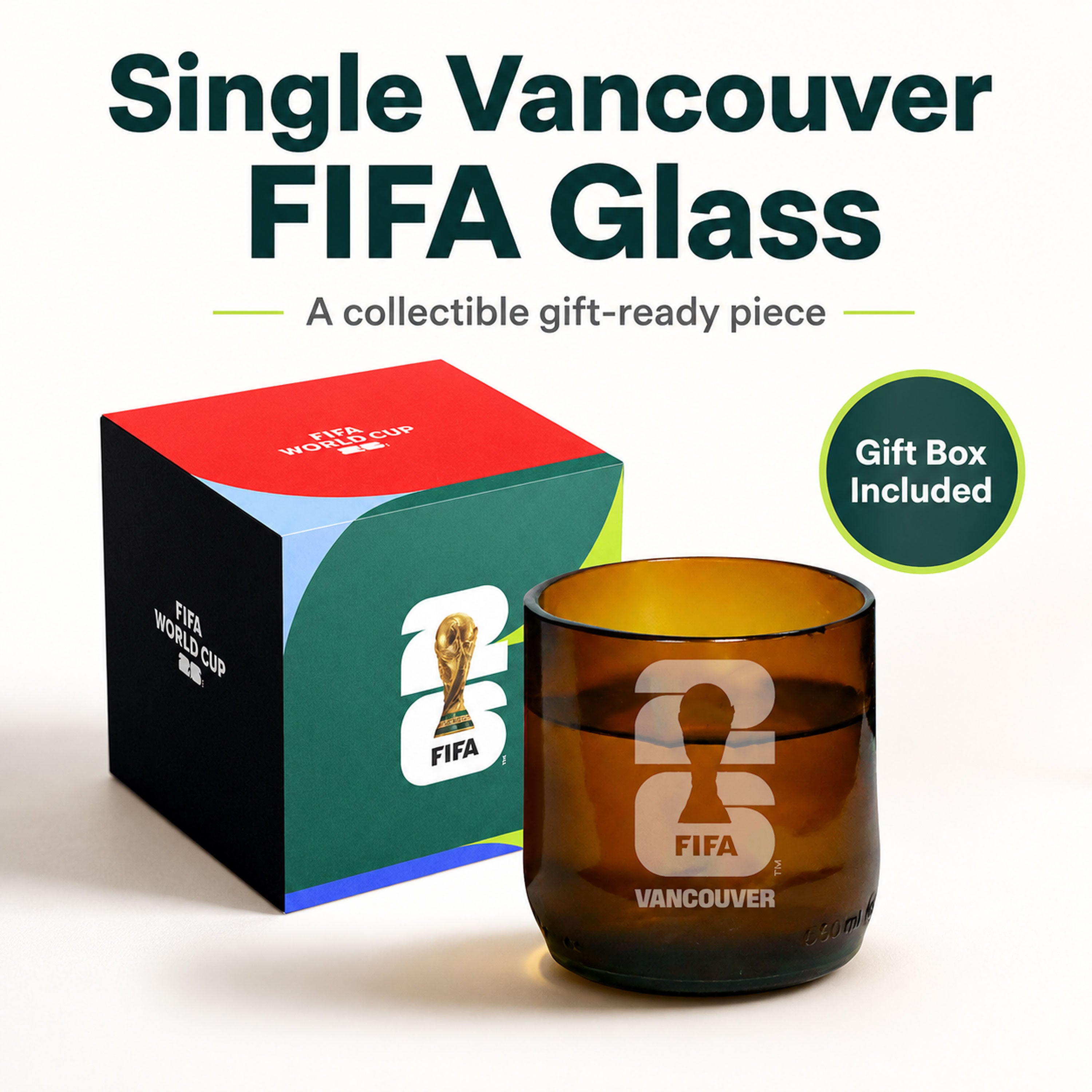 Brown glass with FIFA Vancouver logo and gift box on a white background