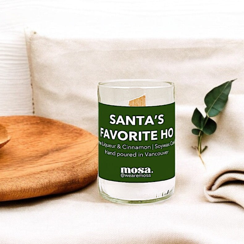 Sustainable gifts made with recyclable glassware, creme liqueur and cinnamon Christmas candle