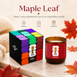 Maple Leaf candle with colorful packaging and FIFA Vancouver logo, surrounded by autumn leaves.