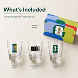 Three shot glasses with FIFA designs and a branded gift box on a light background.
