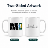 Two white mugs with FIFA Vancouver graphic on one side and minimal skyline illustration on the other, on a white background.