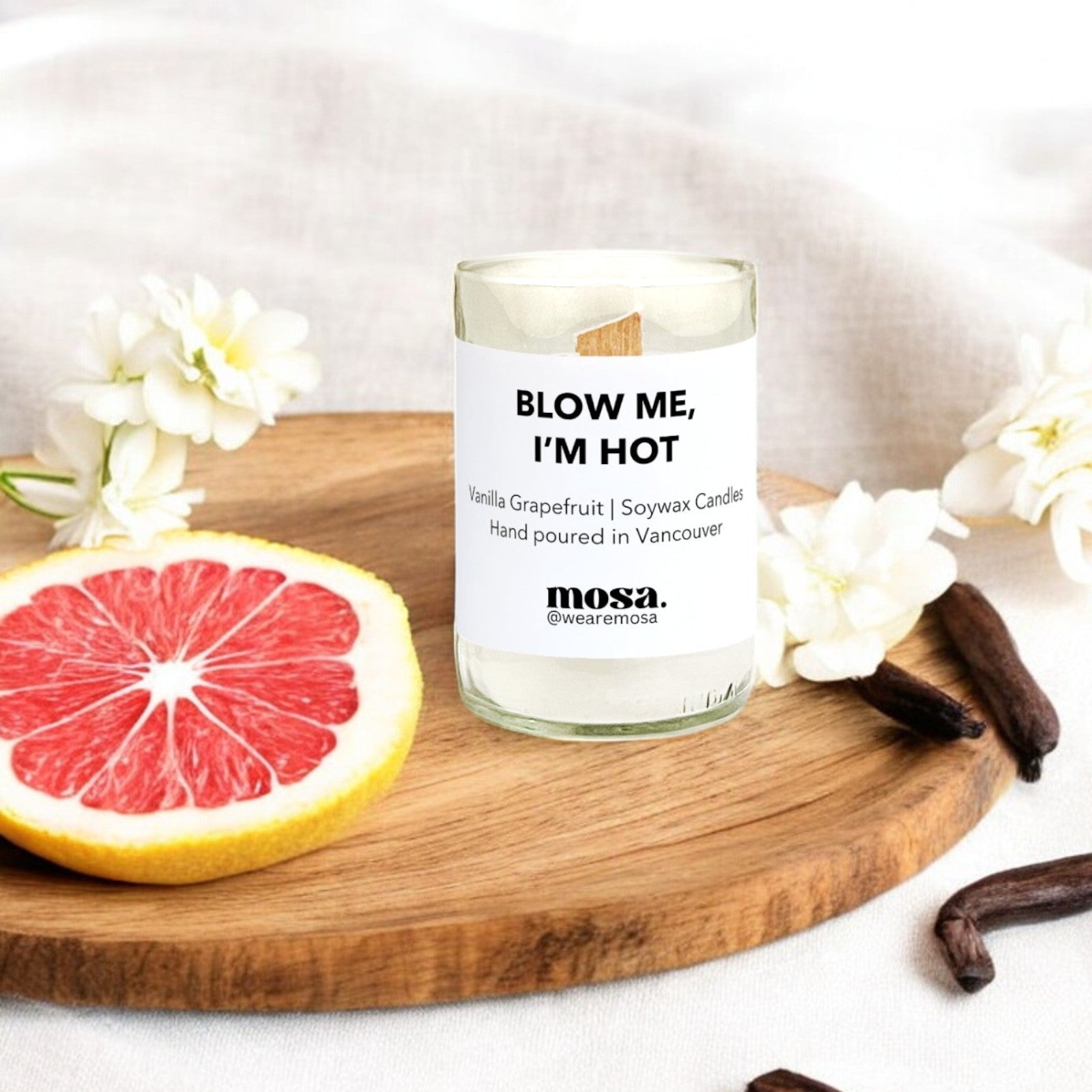 Eco-friendly gifts made with recyclable glassware, vanilla and grapefruit soy wax candle